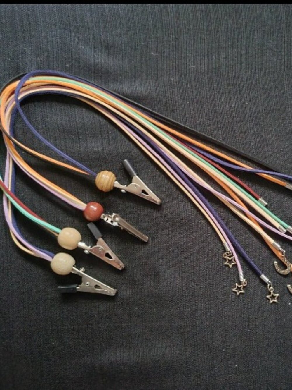 Decorative Festive Clipons in Colorful Braided and Straight Lengths with Charms